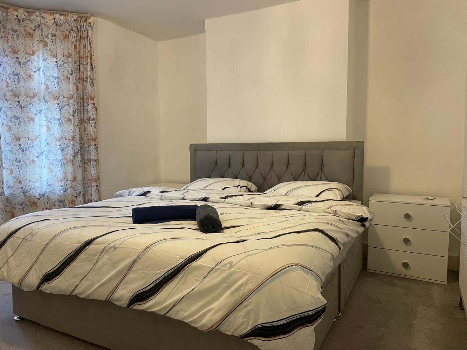 Queen Room with Shared Bathroom